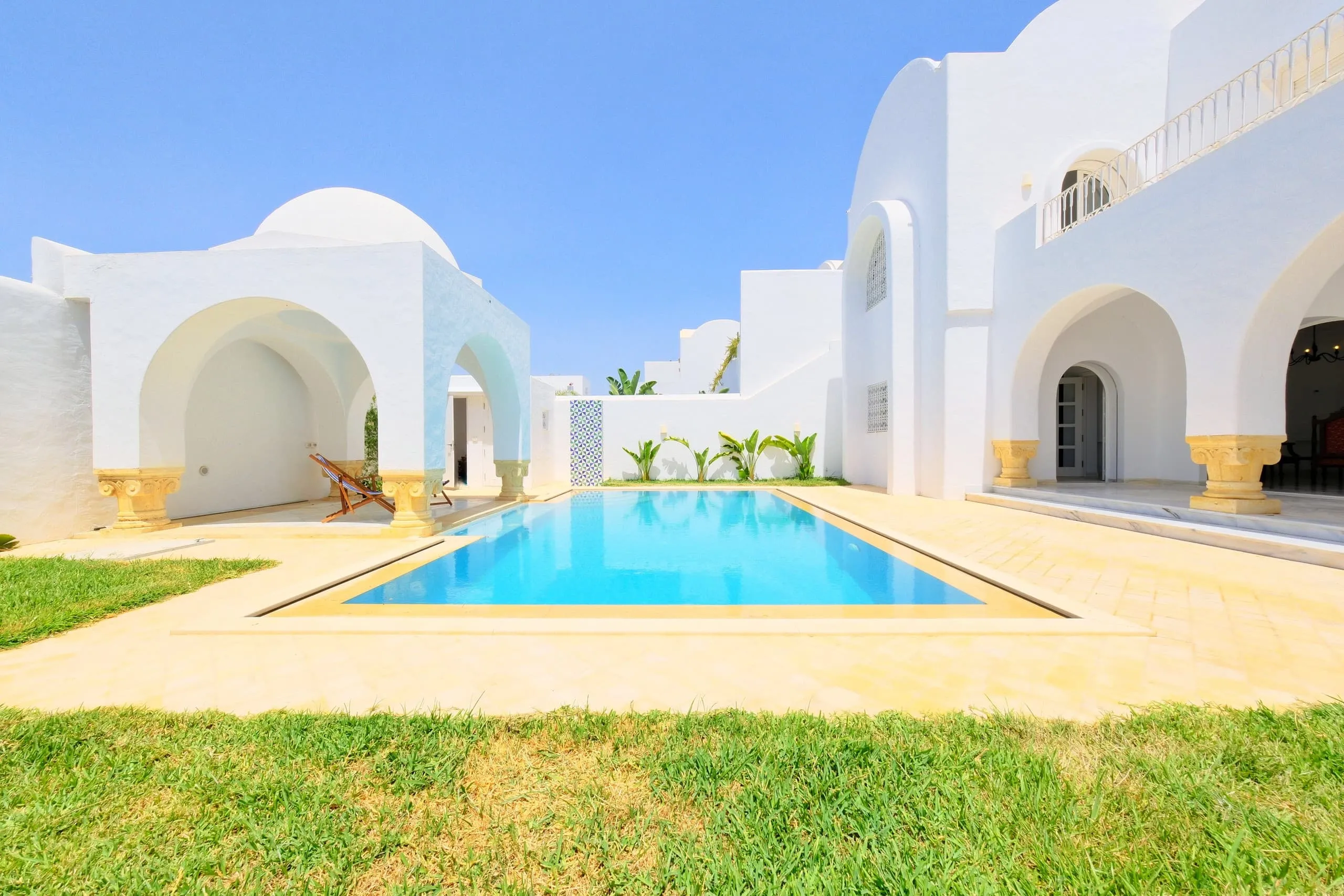 The infinity pool and domed pavilion